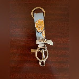 coach loop bag charm with lemon print
